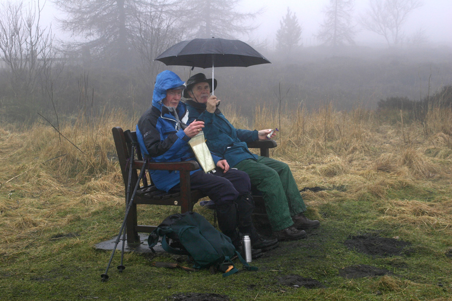 When it started to rain rather heavily, on a walk from Newgate Bank in 2006, Cliff had an umbrella to protect himself and Brian.