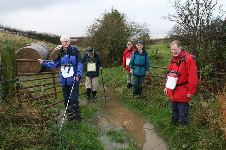 Alan, Brian, Bob, Cliff and Dave on a rather soggy walk in 2006.